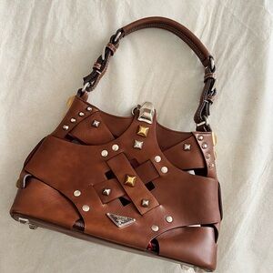 Prada like new vitello cross bag